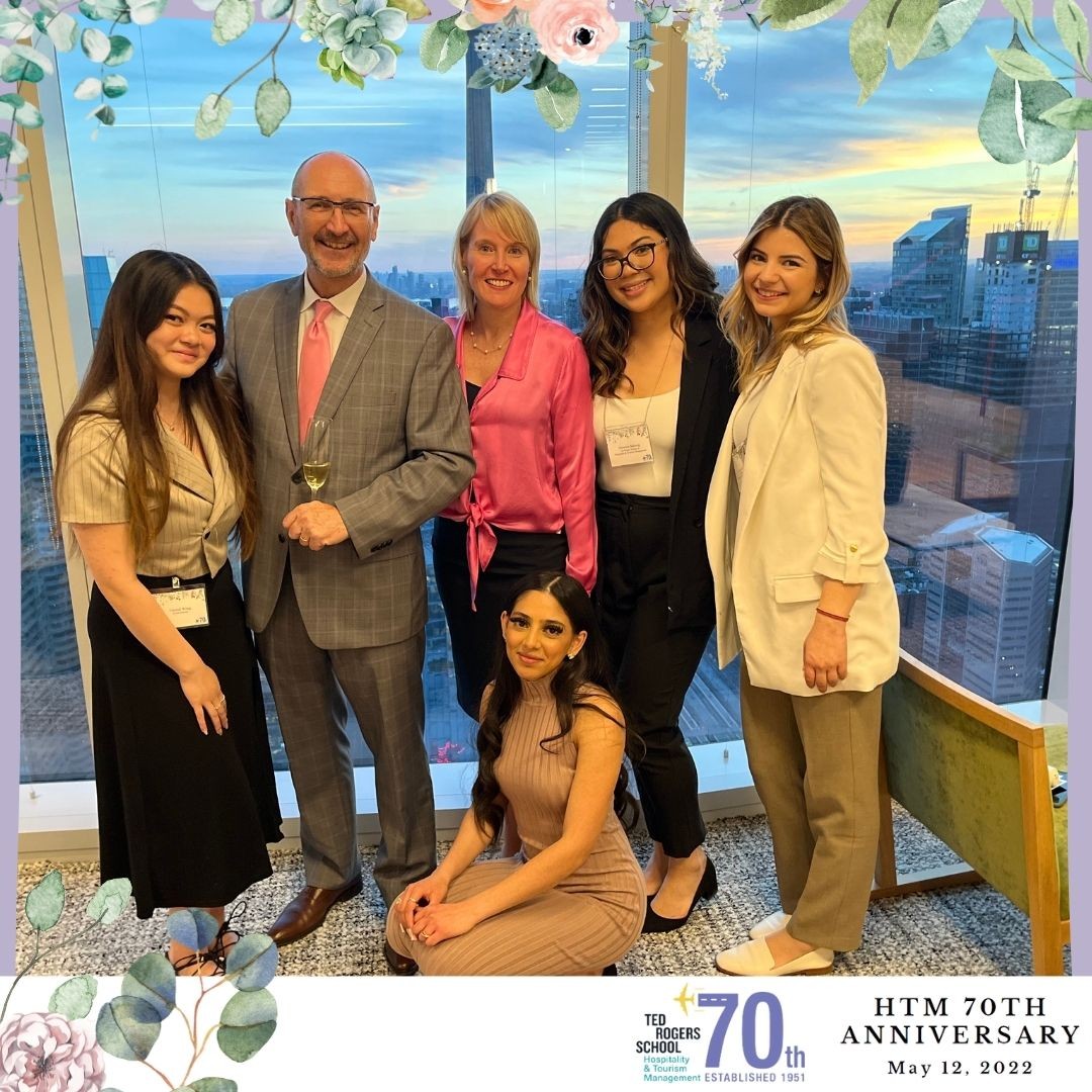 Judy Healy and Dr. Frederic Dimanche with a group of students at HTM's 70th anniversary event.